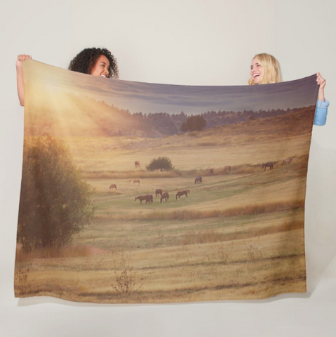Sunset and Horses Fleece Blanket